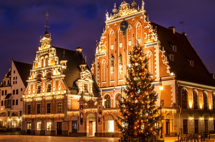 Photo of House of the Blackheads with Christmas tree at night, old town Riga, Latvia.