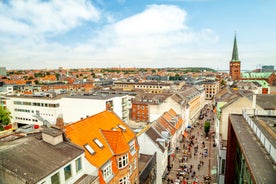 Scenic summer view of Nyhavn pier with color buildings, ships, yachts and other boats in the Old Town of Copenhagen, Denmark