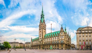 Photo of panorama of New City Hall in Hannover in a beautiful summer day, Germany.