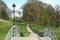 photo of wooden bridge and footpath in Arnhem, Park Sonsbeek in early spring, Netherlands.