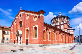 Photo of aerial view of Verona historical city centre, Ponte Pietra bridge across Adige river, Verona Cathedral, Duomo di Verona, red tiled roofs, Veneto Region, Italy.