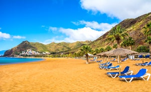 Photo of beach aerial view of Machico bay and Cristiano Ronaldo International airport in Madeira, Portugal.