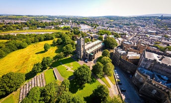 Photo of aerial view of Salisbury cathedral in the spring morning, England.