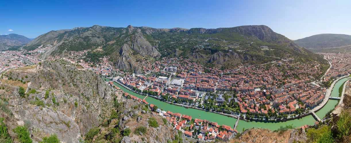 Amasya, Turkey -  Old Ottoman houses panoramic view by the Yesilirmak River in Amasya City. Amasya is populer tourist destination in Turkey.