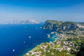 Photo of aerial view of Capri island in a beautiful summer day in Italy.