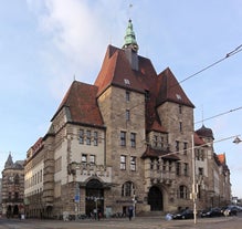 Photo of beautiful panoramic view of historic Bremen Market Square in the center of the Hanseatic City of Bremen with The Schuetting and famous Raths buildings on a sunny day with blue sky in summer, Germany.