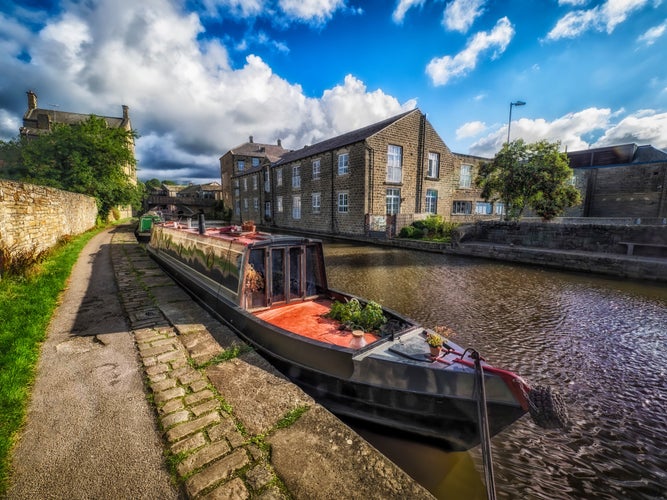 photo of view of Narrow boat moored on the quay in the Leeds and Liverpool Canal at Skipton, craven, England.