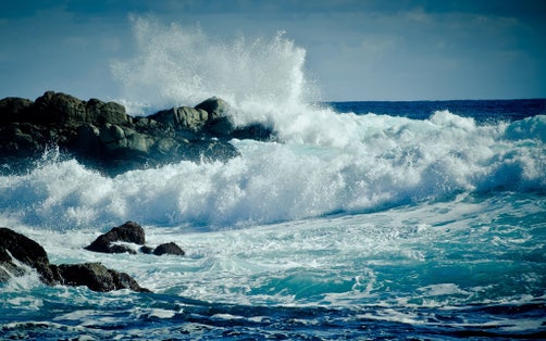 Waves of water of the river and the sea meet each other during high tide and low tide. Whirlpools of the maelstrom of Saltstraumen, Nordland, Norway