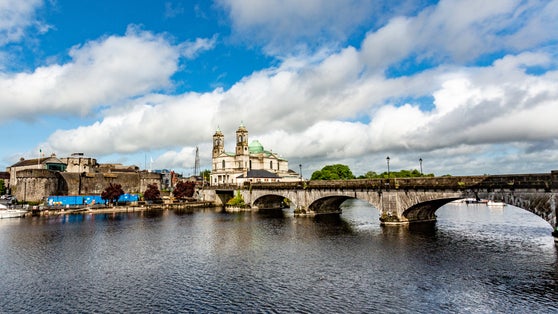 photo of view of Beautiful view of the river Shannon, the bridge, the parish church of Ss. Peter and Paul and the castle in the village of Athlone, wonderful day in the county of Westmeath, Ireland