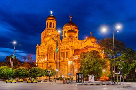 Photo of sunset view of the Dormition of the Theotokos Cathedral in Varna, Bulgaria.