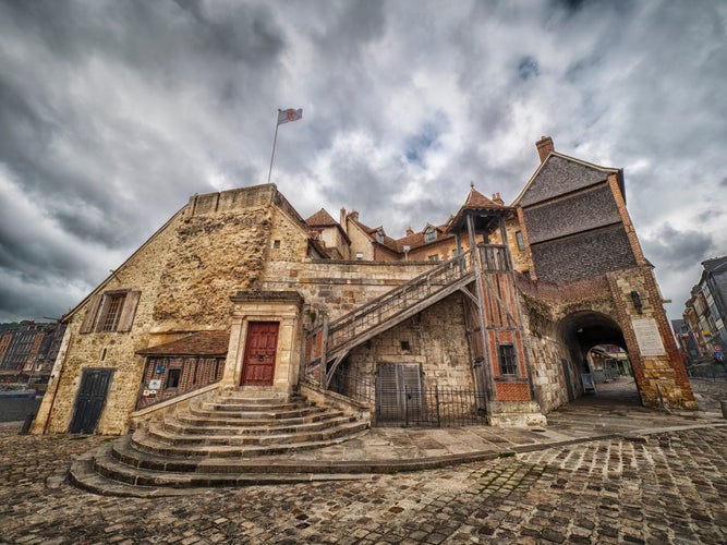 photo of view of La Lieutenance, Honfleur, France - A view of a historic building in Honfleur, France.