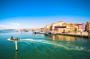 Photo of Aerial view of the white tall apartment buildings of the coast of Chioggia in Italy.