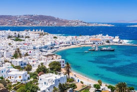 Photo of beautifull view over Mykonos from the sky with drone at the whitewashed village Greece.