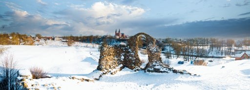 Photo of aerial view of Bauska Castle that is a complex consisting of the ruins of an earlier castle and a later palace on the outskirts of the Latvian city of Bauska, Latvia.