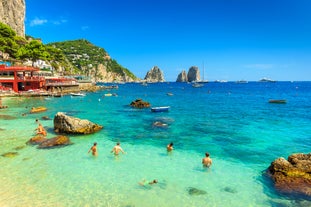 Photo of aerial view of Capri island in a beautiful summer day in Italy.