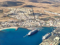 Photo of scenic aerial view of colorful traditional village of El Cotillo in Northen part of island. Canary islands of Spain.