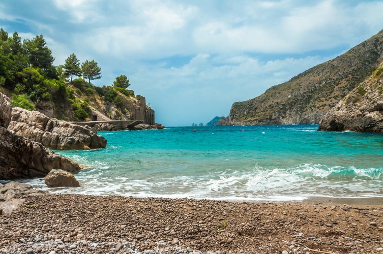 Photo of beautiful beachside in Sorrento Peninsula, the front of the Isle of Capri, Italy.