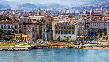 Photo of view of Cefalu and Promontorio de Torre Caldura seen from Norman Castle, La Rocca park, Italy.