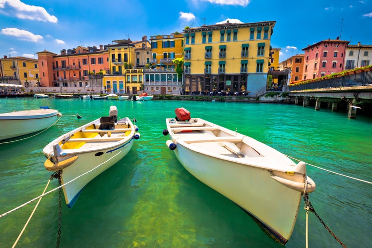 Peschiera del Garda colorful harbor and boats view, Lago di Garda, Veneto region of Italy