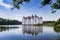 photo of view of Historic castle with reflection in the lake in Glucksburg, Germany.