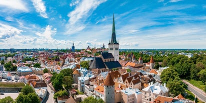 Scenic summer view of the Old Town and sea port harbor in Tallinn, Estonia.