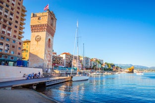 Photo of beautiful street and traditional buildings of Savona, Liguria, Italy.