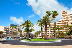 photo of landscape with Maspalomas town and golden sand dunes at sunrise, Gran Canaria, Canary Islands, Spain.