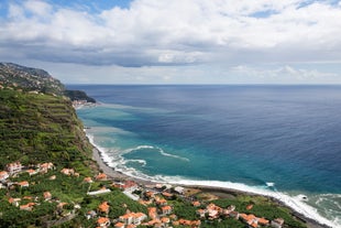 Aerial drone view of Camara de Lobos village, Madeira.