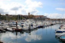 Getaria con obrador de productos del mar y San Sebastián