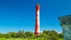 Photo of red Pakri Lighthouse found in the town of Paldiski in Estonia one of the tourist spots in the city.