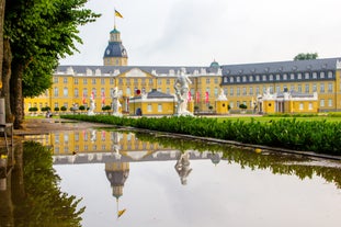 Photo of aerial panoramic view of Hohes Schloss Fussen or Gothic High Castle of the Bishops and St. Mang Abbey monastery in Fussen, Germany.