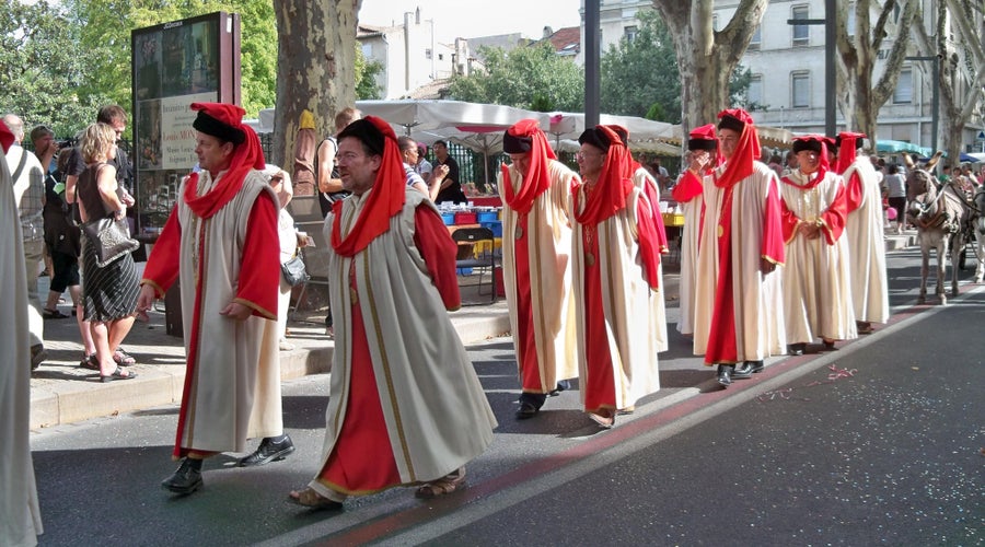 Jurade of Saint-Émilion procession during the Ban des Vendanges harvest festival, with members in ceremonial robes..jpg