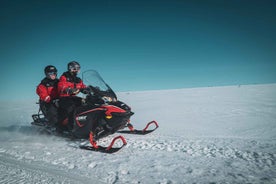 From Alta: Daytime Snowmobile Adventure