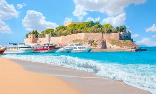 Photo of aerial view of Kuşadası beach resort town on Turkey’s western Aegean coast.