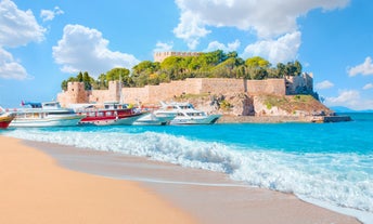 Photo of aerial view of Kuşadası beach resort town on Turkey’s western Aegean coast.