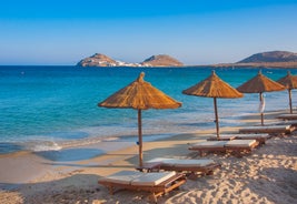 Photo of panoramic aerial view of the popular Platis Gialos beach on the Greek island of Mykonos with turquoise sea, Greece.