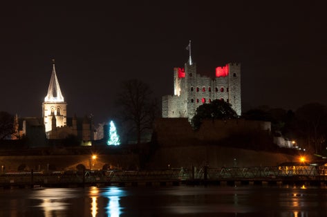 Photo of Rochester castle and cathedral at night, UK.