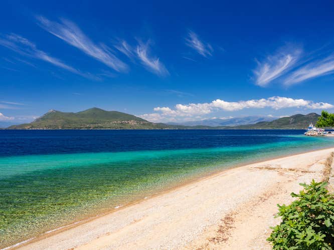 Photo of beautiful beach of the Greek spa resort of Loutra Edipsou on the island of Evia (Euboea), Greece.