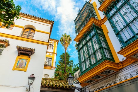 Photo of historic buildings in the Santa Cruz district of Seville, Spain.