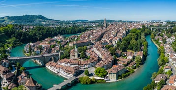 Bern, Switzerland. View of the old city center and Nydeggbrucke bridge over river Aare.