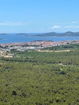 Photo of aerial view of Brodarica village near Sibenik beach and coastline, Dalmatia region of Croatia.