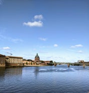 Photo of Toulouse and Garonne river aerial panoramic view, France.