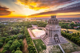 Photo of aerial panoramic view of Hohes Schloss Fussen or Gothic High Castle of the Bishops and St. Mang Abbey monastery in Fussen, Germany.