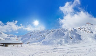 Photo of aerial view over Saalbach village in summer, Austria.