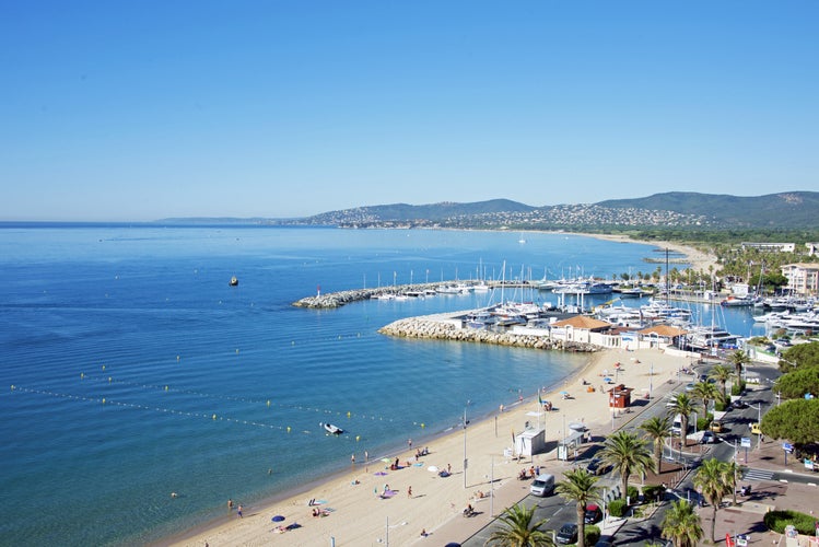 Panoramic view of urban beach of Frejus city on Cote d'Azur (Coast of Azure) of French Riviera in summer