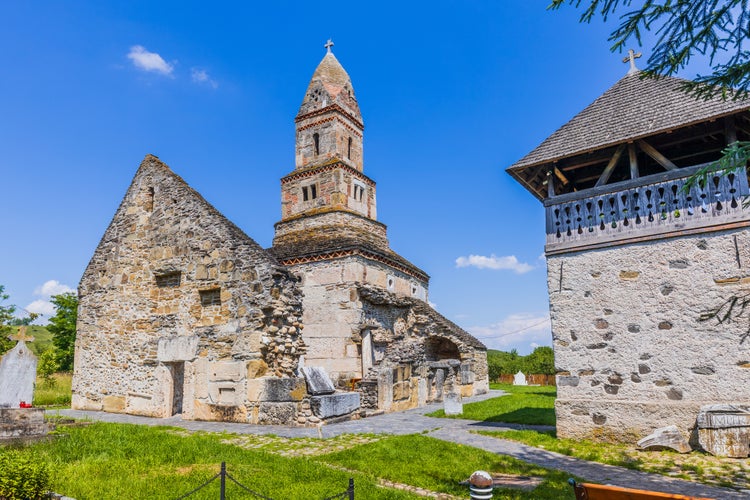 Photo of Densus Christian Church (Saint Nicholas' Church), Dacian and Roman temple, in Densus village, Hunedoara, Hateg, Romania.