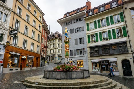 photo of Fountain of Justice (Fontaine de la Justice) at Place de la Palud in Lausanne, Switzerland.