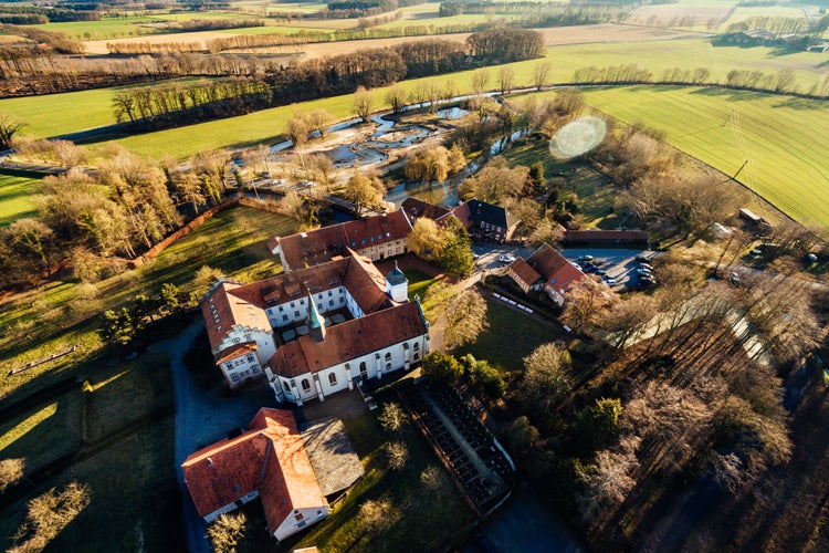 Photo of Aerial view on the monastery of Kloster Vinnenberg, a popular landmark and tourist site in Warendorf, Münsterland, Westfalia, Germany.