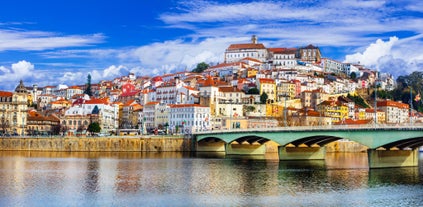 Photo of Lisbon City Skyline with Sao Jorge Castle and the Tagus River, Portugal.