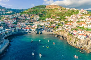 Aerial drone view of Camara de Lobos village, Madeira.